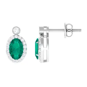 1 CT Oval Emerald and Diamond Halo Stud Earrings