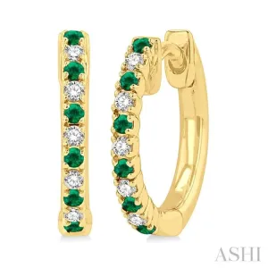 1/10 ctw Petite 1.35 MM Emerald and Round Cut Diamond Precious Fashion Huggies in 10K Yellow Gold