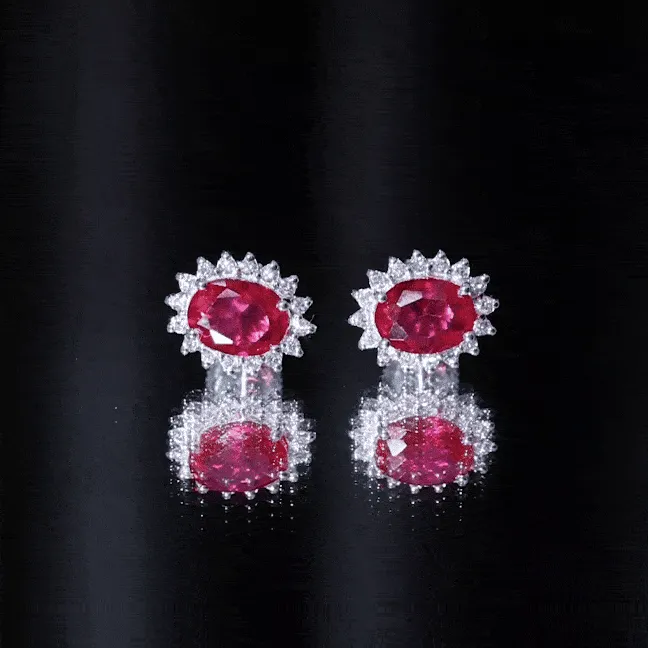 2.5 CT Oval Cut Created Ruby Statement Stud Earrings with Diamond Halo