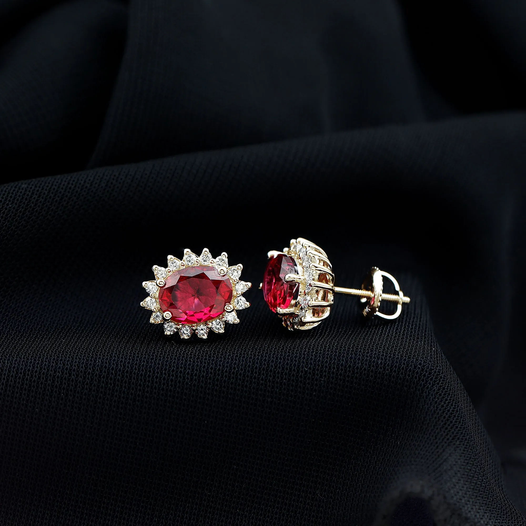 2.5 CT Oval Cut Created Ruby Statement Stud Earrings with Diamond Halo