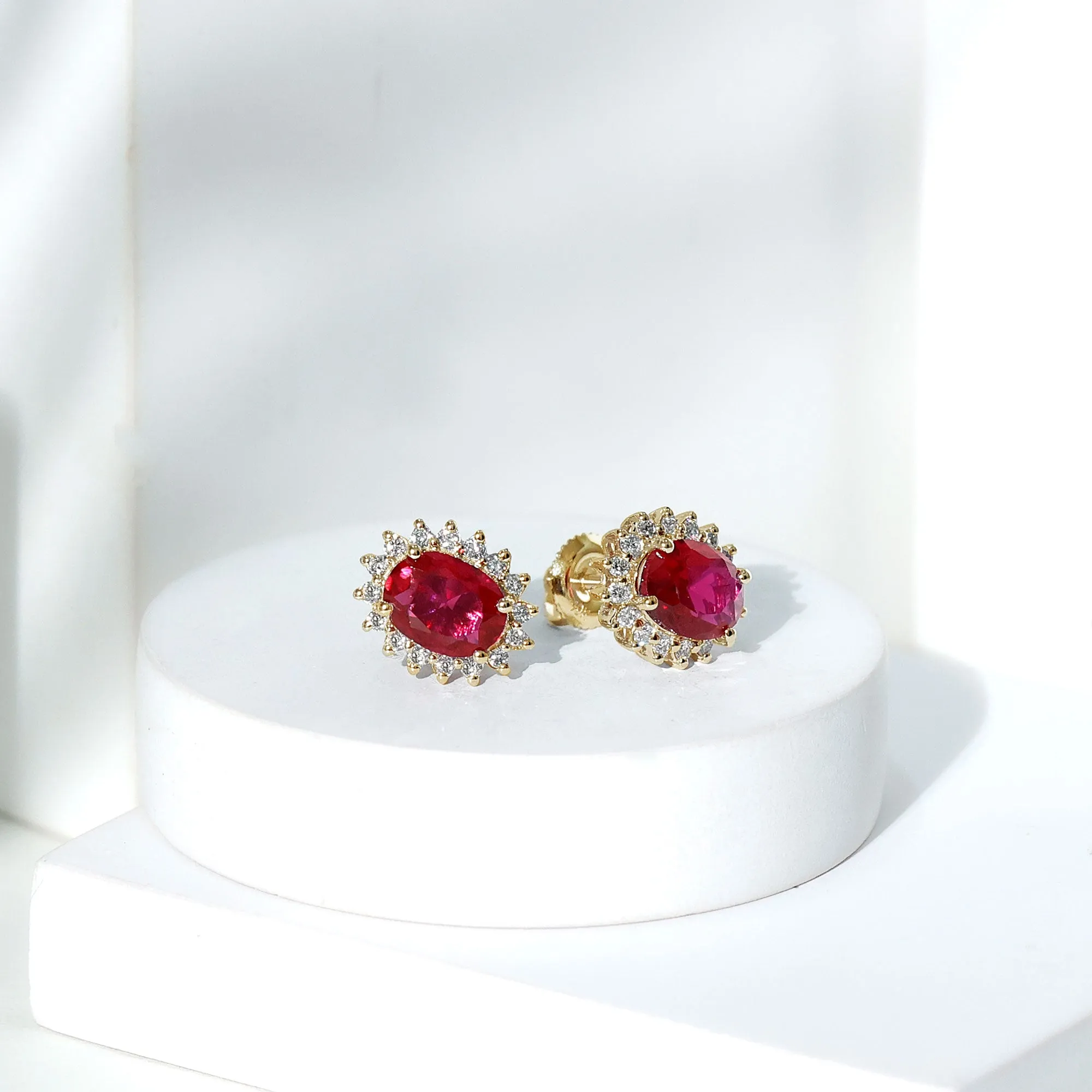 2.5 CT Oval Cut Created Ruby Statement Stud Earrings with Diamond Halo