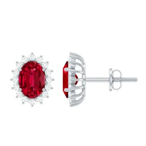 2.5 CT Oval Cut Created Ruby Statement Stud Earrings with Diamond Halo