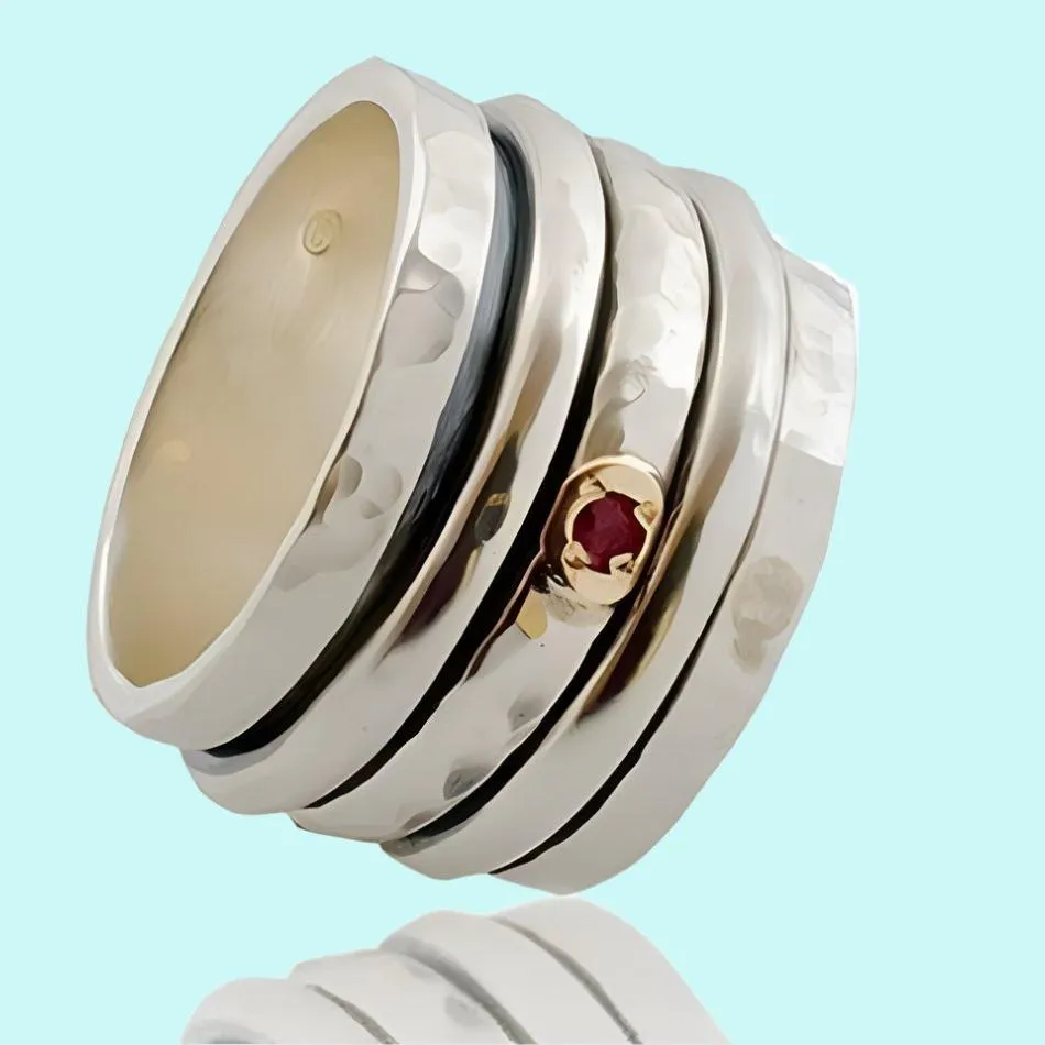 Spinner Ring Jewelry. Sterling Silver and 9kt gold Ring set with Garnet